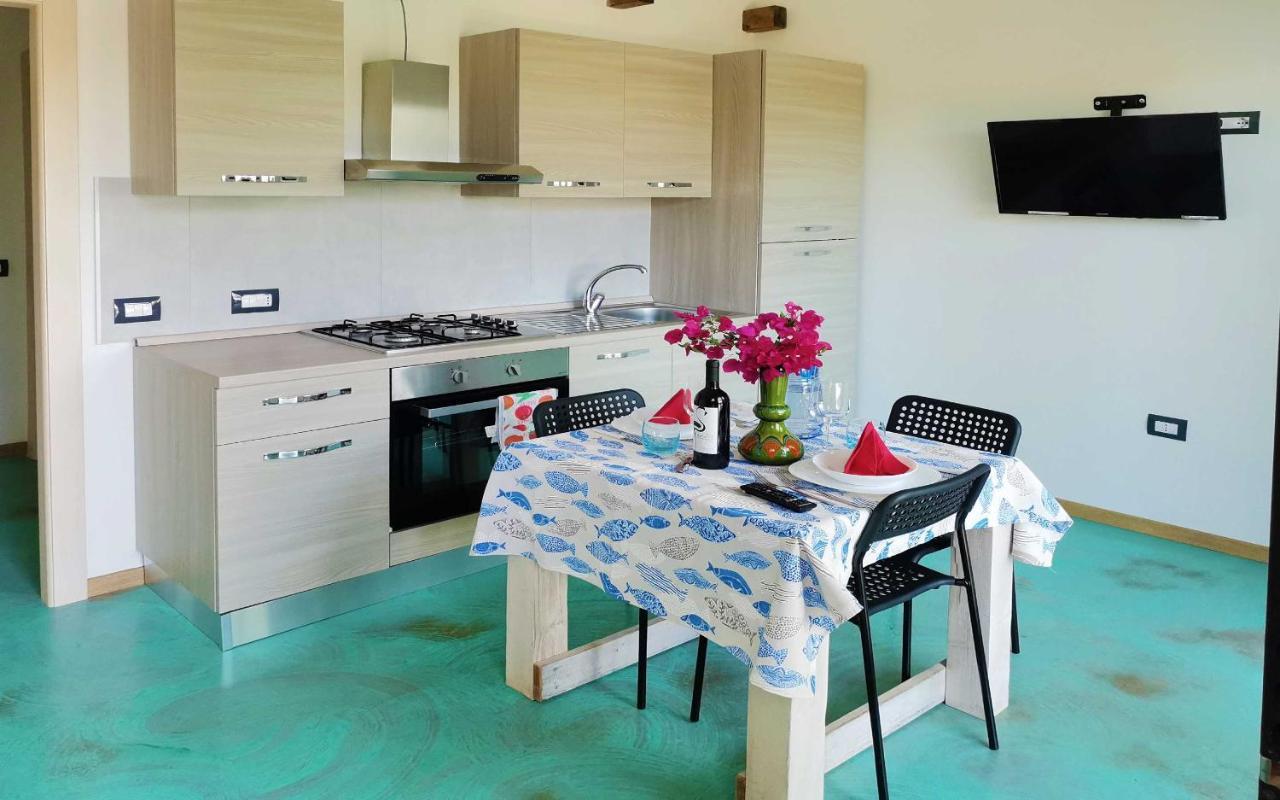 Panohome Porto Pino Exterior photo